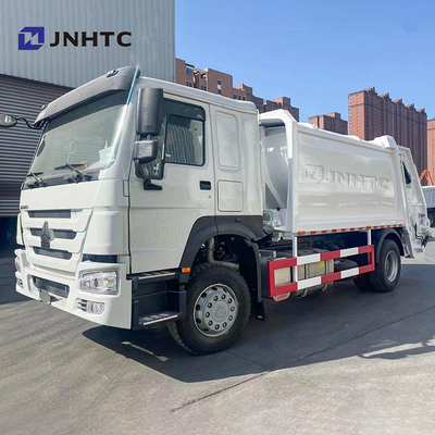 Truk Pemadat Sampah Sinotruck 371HP Truk Sampah HOWO 4X2