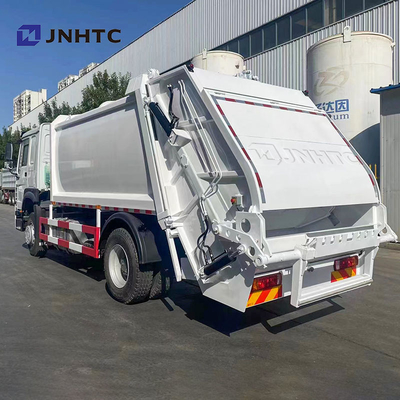 Truk Pemadat Sampah Sinotruck 371HP Truk Sampah HOWO 4X2