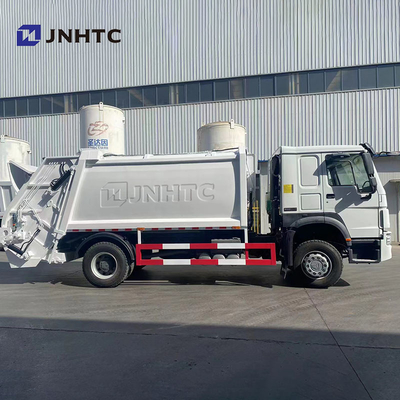 Truk Pemadat Sampah Sinotruck 371HP Truk Sampah HOWO 4X2
