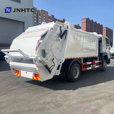 Truk Pemadat Sampah Sinotruck 371HP Truk Sampah HOWO 4X2