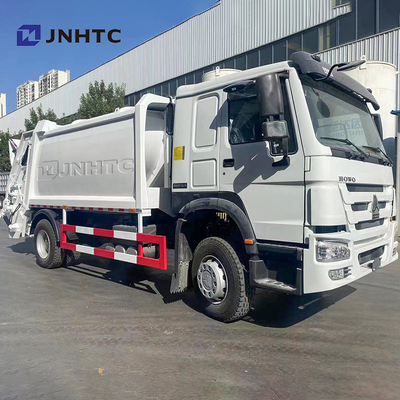 Truk Pemadat Sampah Sinotruck 371HP Truk Sampah HOWO 4X2