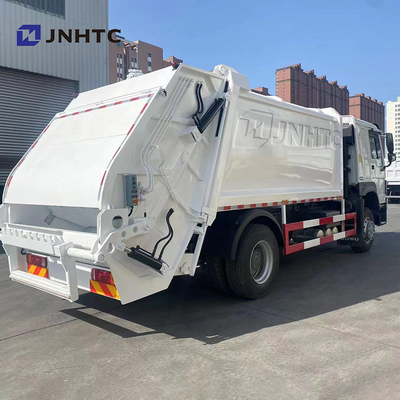 Truk Pemadat Sampah Sinotruck 371HP Truk Sampah HOWO 4X2