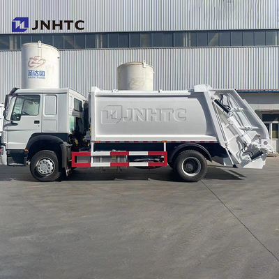 Truk Pemadat Sampah Sinotruck 371HP Truk Sampah HOWO 4X2