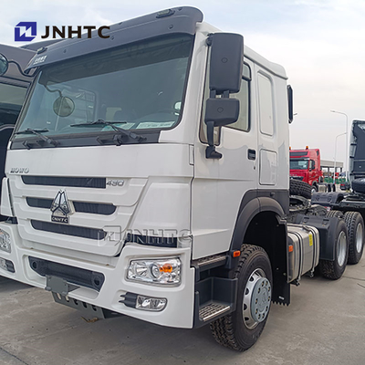 Hot Sales SINOTRUK 6X4 400HP Traktor Truk Kepala Trailer berkualitas tinggi