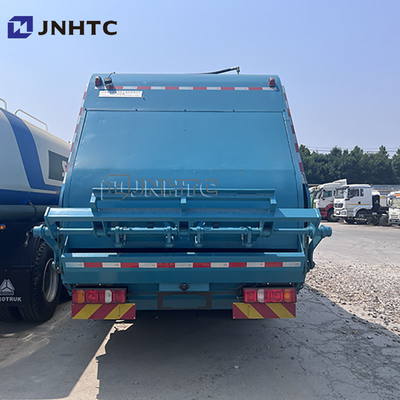 Howo SITRAK 4*2 Pengangkut Belakang Truk Sampah yang Dikompresi Truk Sampah