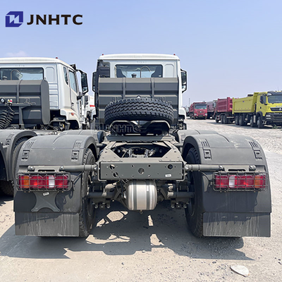 HOWO NX 10 Roda 380hp Semi Traktor Truk Kepala Diesel Bahan bakar Transmisi manual kanan Euro 2 Jual cepat harga rendah