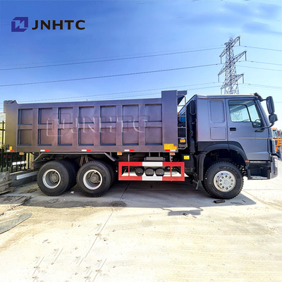 Truk dump 6x4 10 roda terbaik 336hp 40 Ton Digunakan Sinotruk Gerak kiri / kanan Truk tipper