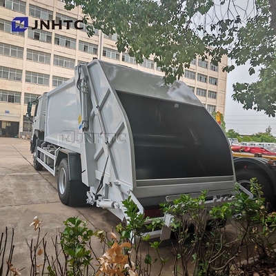HOWO Truk Sampah Compactor 4x2 Euro 2 Penghapusan Sampah Truk Belakang Truk Diesel Hijau Model Baru