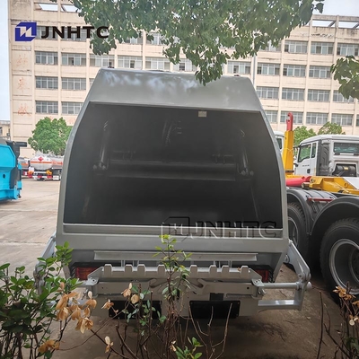 HOWO Truk Sampah Compactor 4x2 Euro 2 Penghapusan Sampah Truk Belakang Truk Diesel Hijau Model Baru