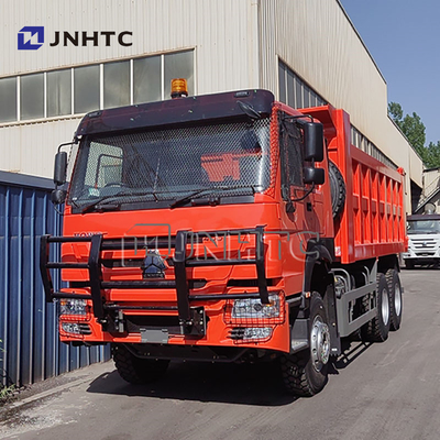 Heavy Duty Sinotruck Howo Camion 6x4 10 Wheeler 400 hp 30Ton Tipper Dump Truck Dengan Jaring Anti Pencurian