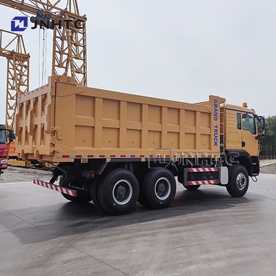 Truk Tipper Pengangkut Pasir Tanah Batu HOWO TX 12 Roda 35 Ton untuk Pengangkutan Barang Tambang