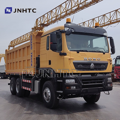 Truk Tipper Pengangkut Pasir Tanah Batu HOWO TX 12 Roda 35 Ton untuk Pengangkutan Barang Tambang