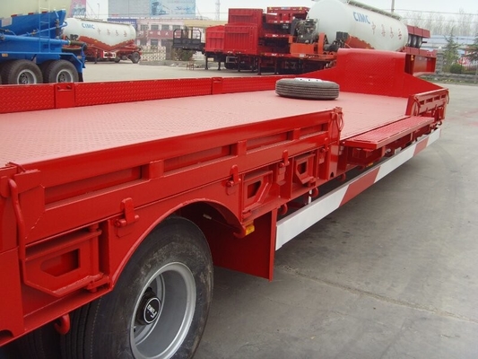 Promosi 4 Gandar 60 Ton Tempat Tidur Rendah Semi Trailer Tugas Berat Dengan Umur Panjang