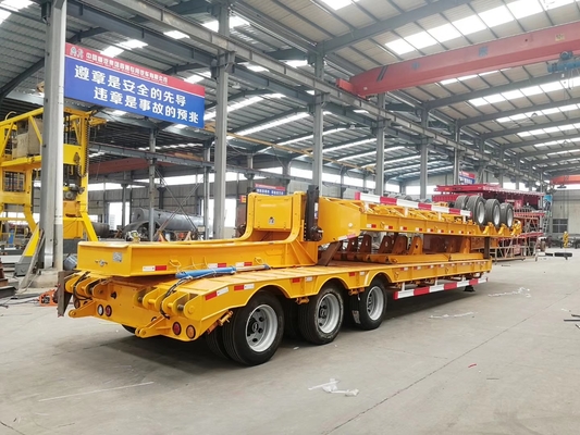 100T Low Bed Heavy Duty Trailer Semi / 3 Axle Lowboy Trailer Dalam Penangguhan Mekanik