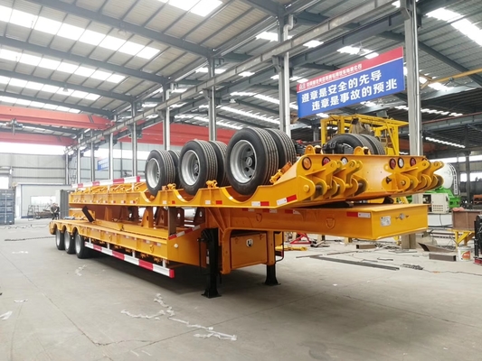 100T Low Bed Heavy Duty Trailer Semi / 3 Axle Lowboy Trailer Dalam Penangguhan Mekanik