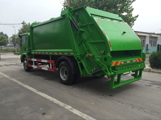 SINOTRUK HOWO 4 * 2 Truk Pemadat Sampah 12m3 Dipadatkan