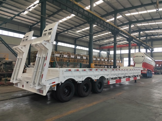 Q235 Steel 100T Low Bed Tugas Berat Semi Trailer Dalam Penangguhan Mekanis