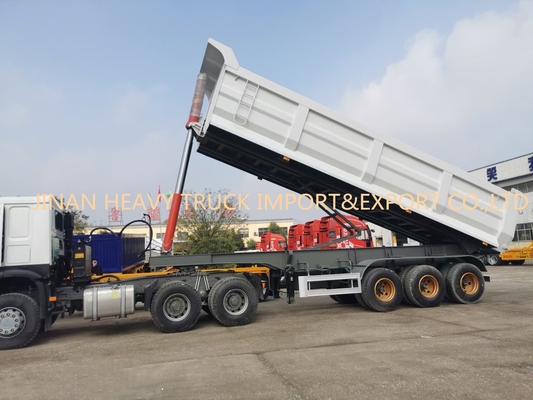 Three Axle Front 50 Ton Sinotruk Dump Truck Untuk Transportasi Pasir